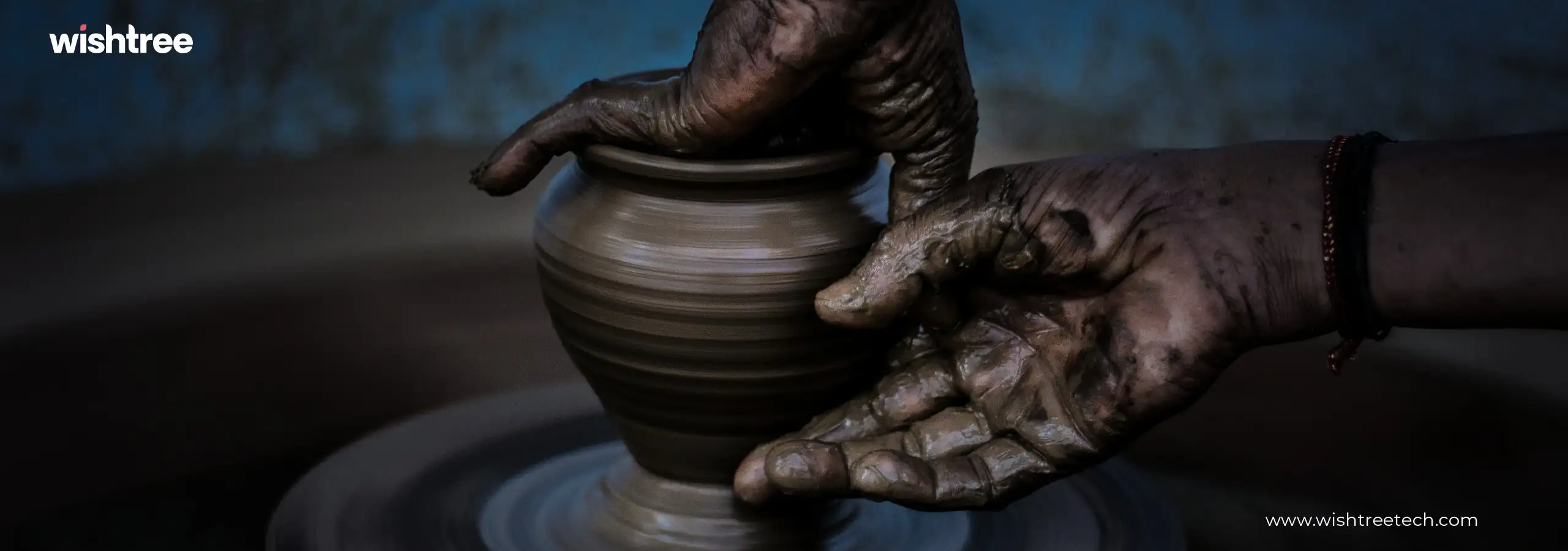 Hands skillfully shaping a clay pot on a potter's wheel, symbolizing custom creation and product development.