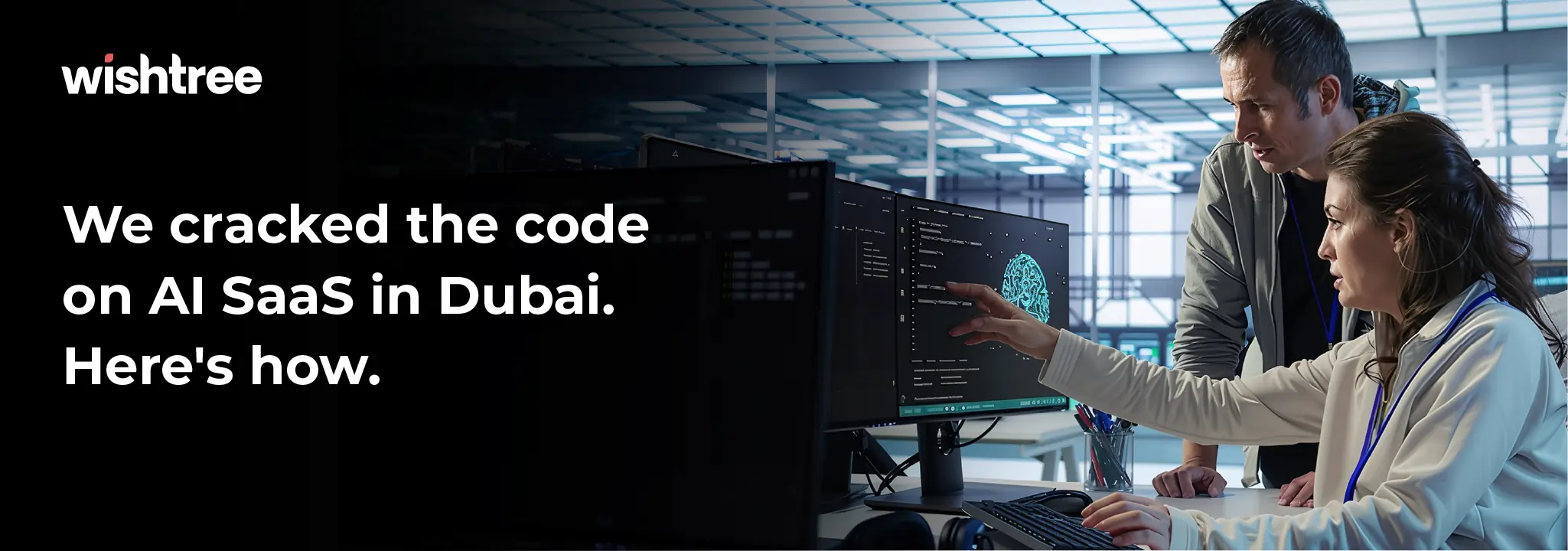 Two software developers analyzing a screen with an AI brain graphic, illustrating the development of AI SaaS solutions in Dubai.